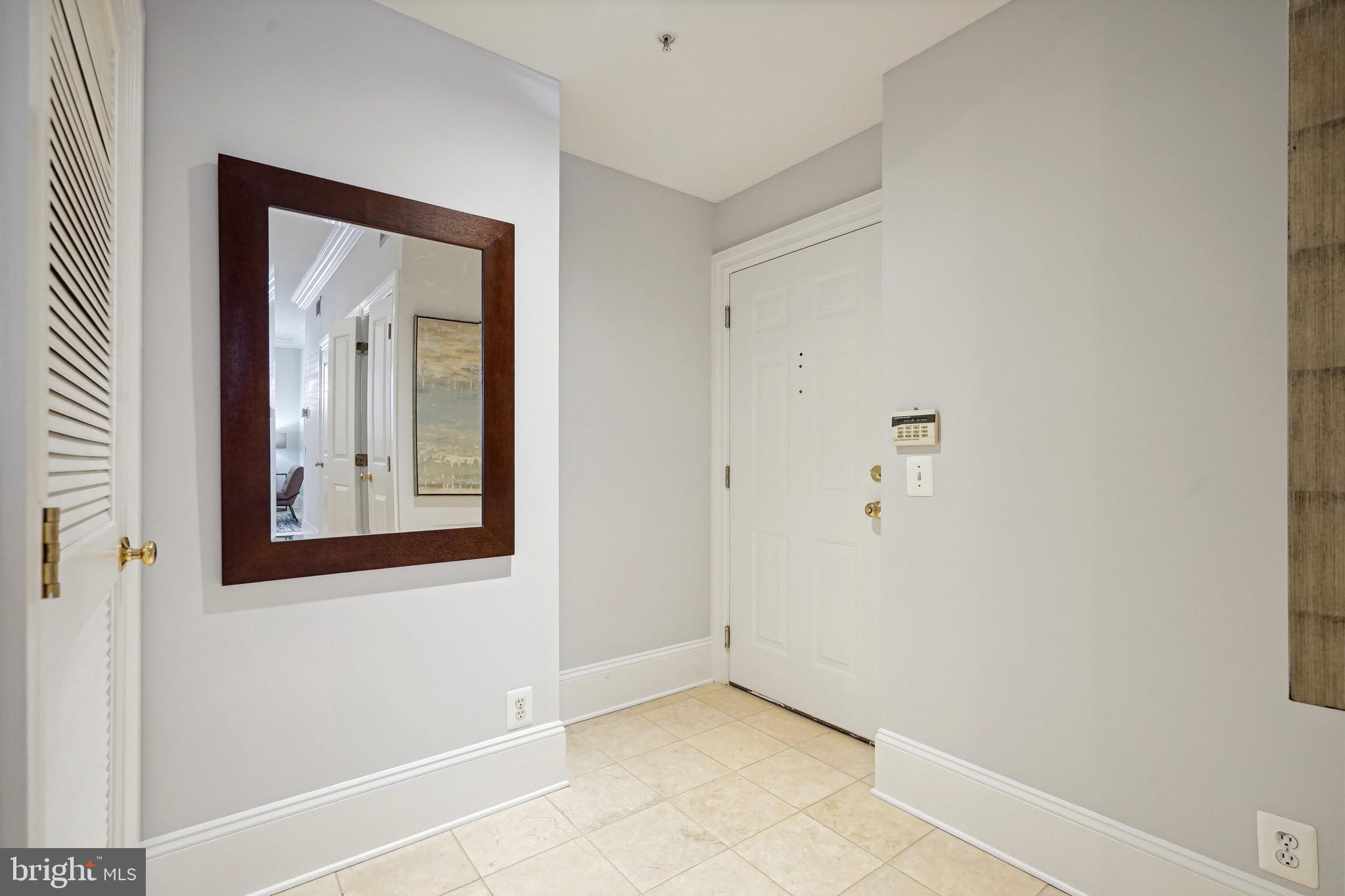 1520 O Street Northwest, Unit T8 Washington, DC 20005 - Photo 2 of 20 Spacious marble foyer/entry with coat closet