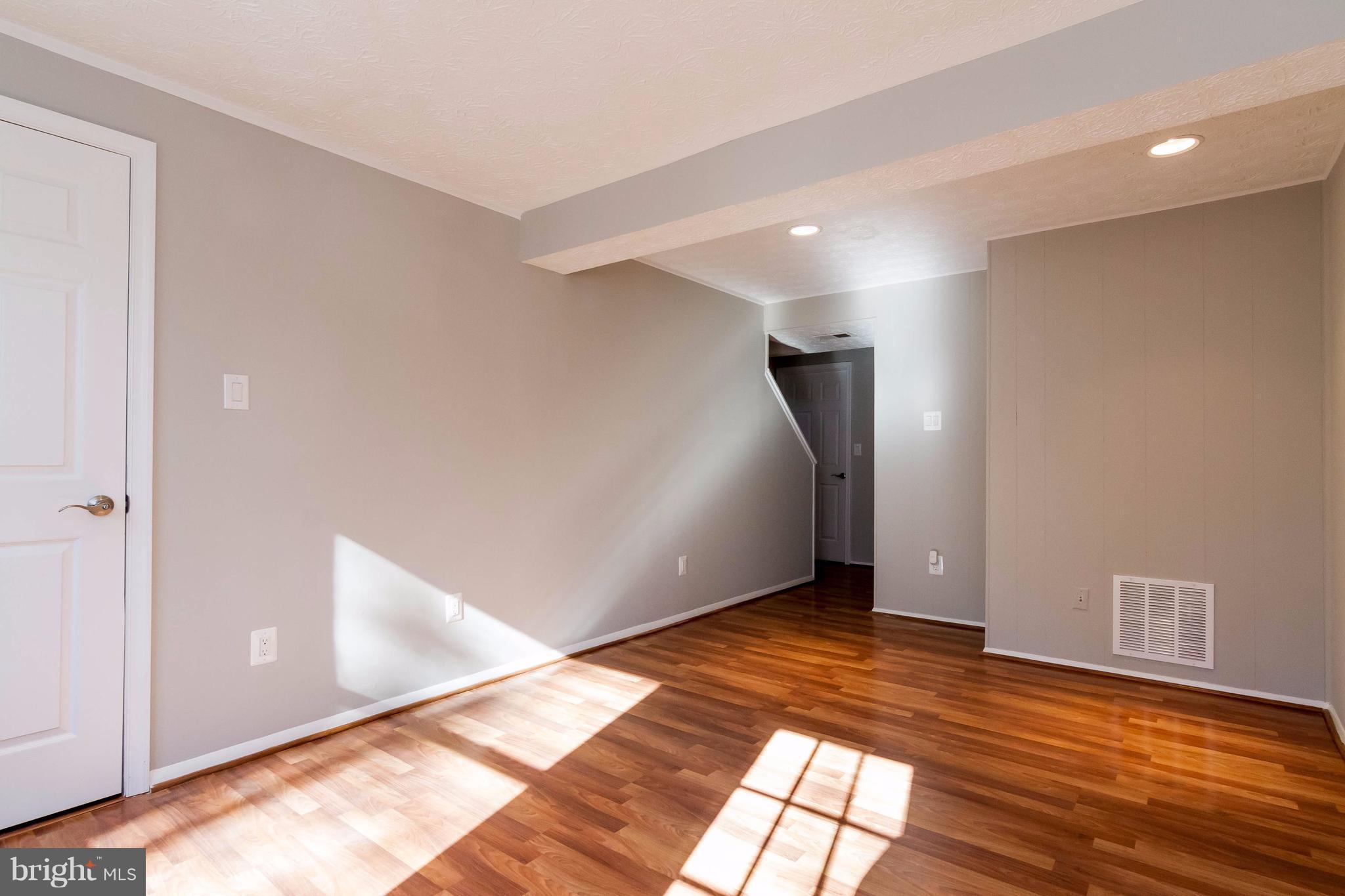 8030 Grandview Court Springfield, VA 22153 - Photo 13 of 27 Basement- recessed lighting, pergo flooring