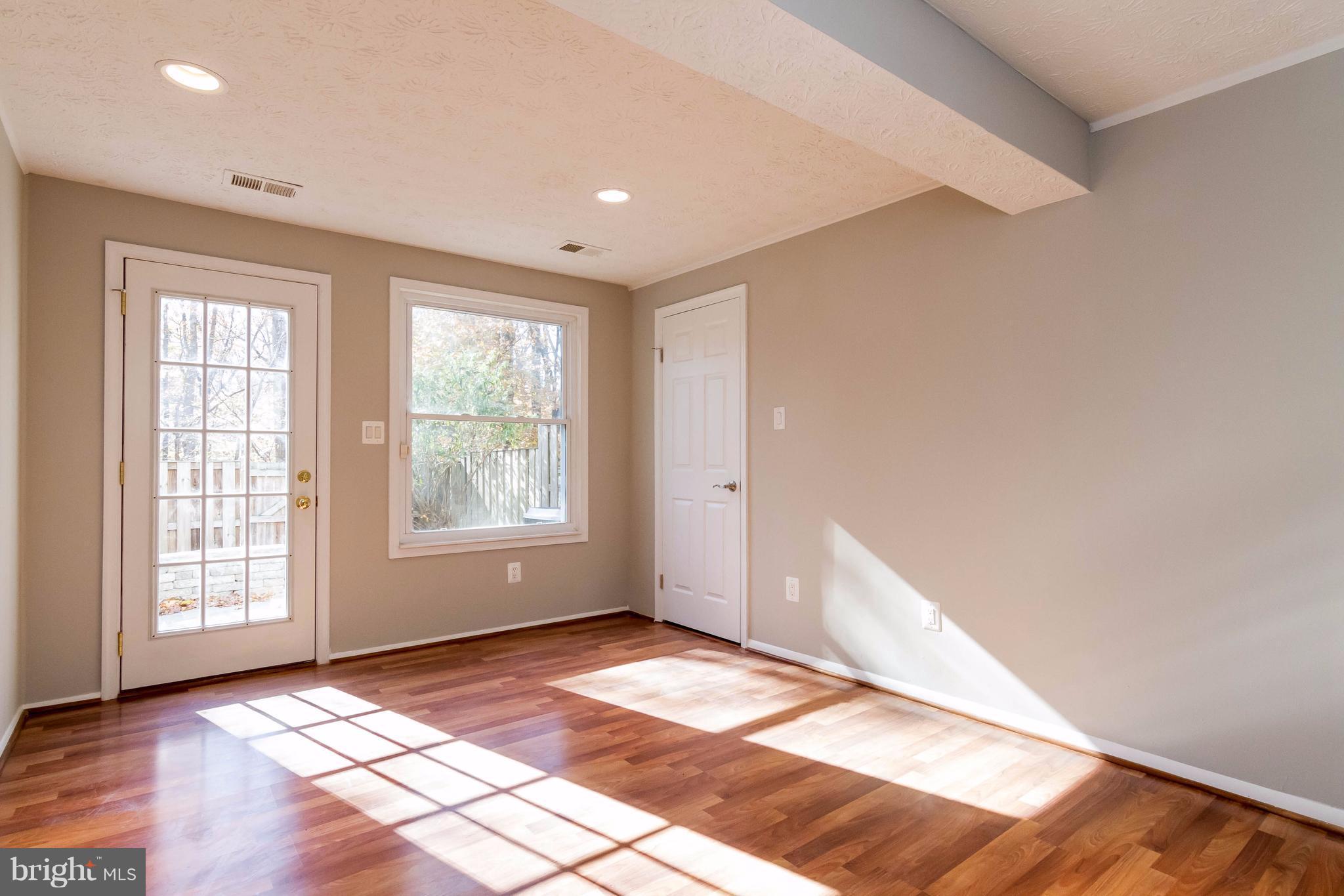 8030 Grandview Court Springfield, VA 22153 - Photo 15 of 27 Basement- lots of light! Pergo flooring