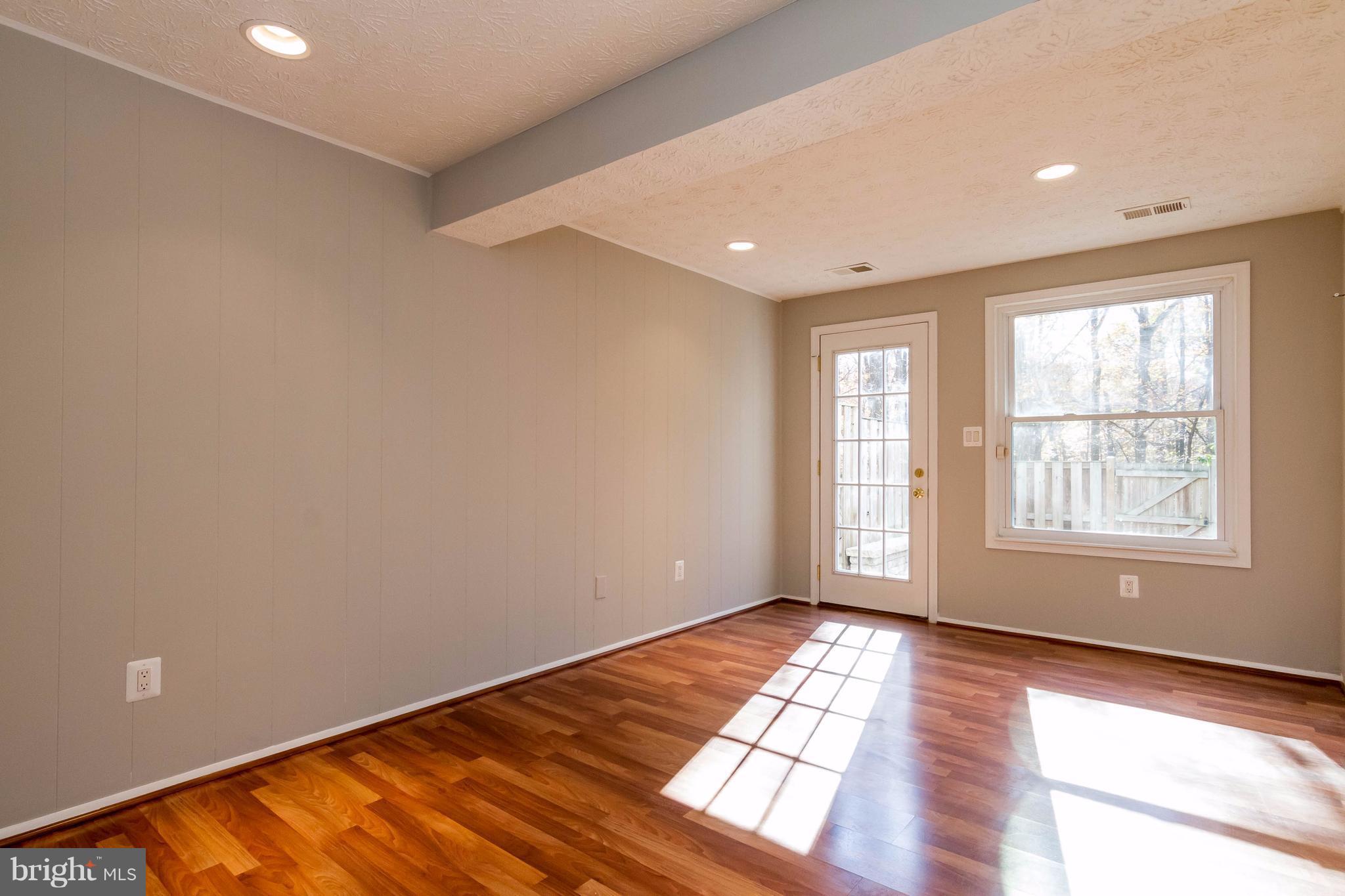 8030 Grandview Court Springfield, VA 22153 - Photo 16 of 27 Basement- pergo flooring