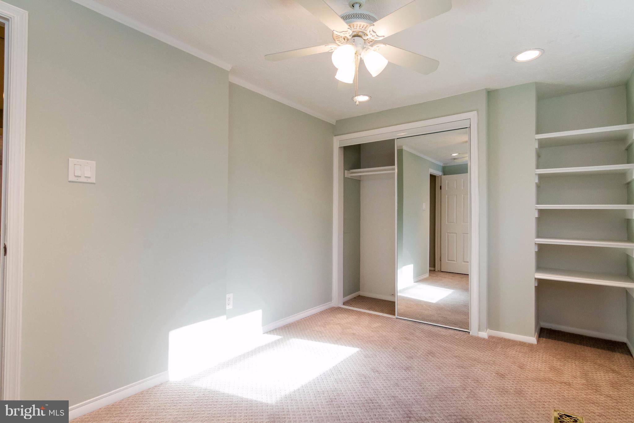 8030 Grandview Court Springfield, VA 22153 - Photo 18 of 27 Upstairs Bedroom 1- built in shelving