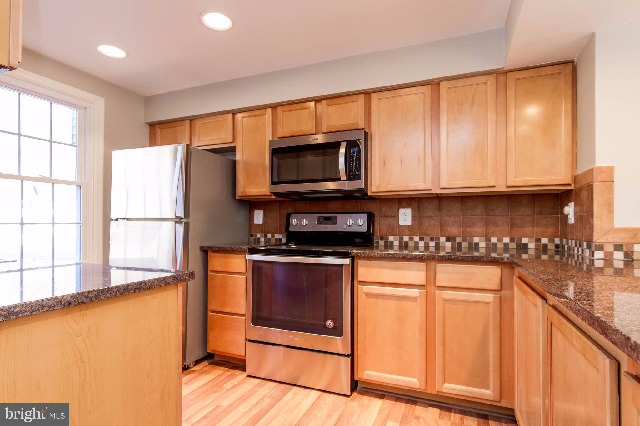 8030 Grandview Court Springfield, VA 22153 - Photo 10 of 27 Kitchen- new microwave, stove, dishwasher, fridge