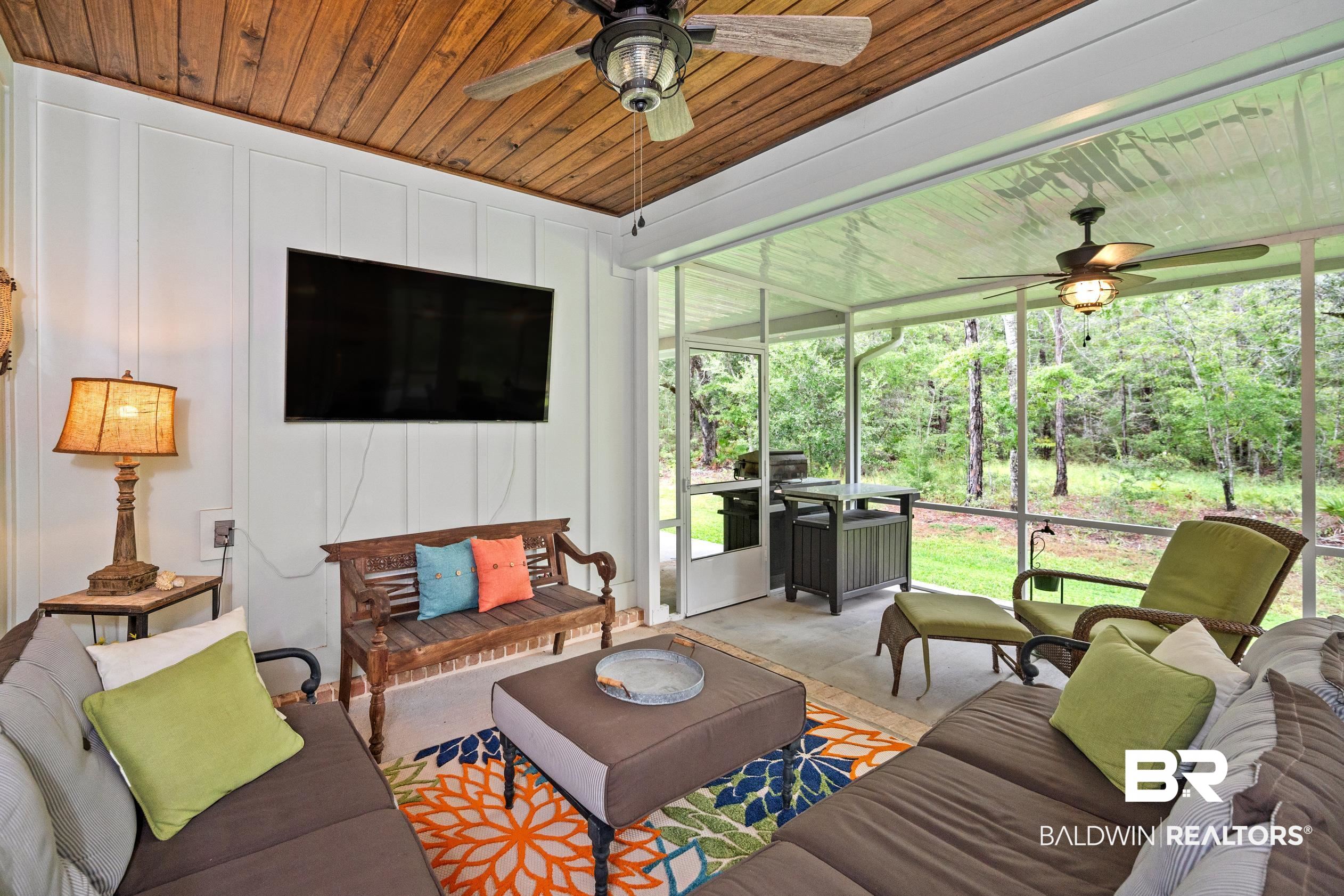 4601 Surrey Lane Orange Beach, AL 36561 - Photo 38 of 43 ceiling fan and wooden ceiling