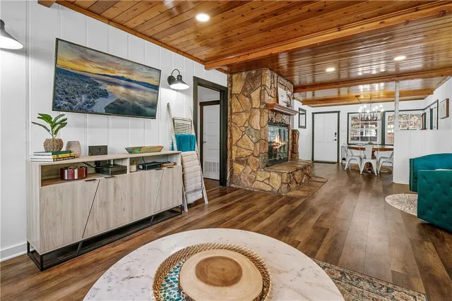 a living room with furniture and a table