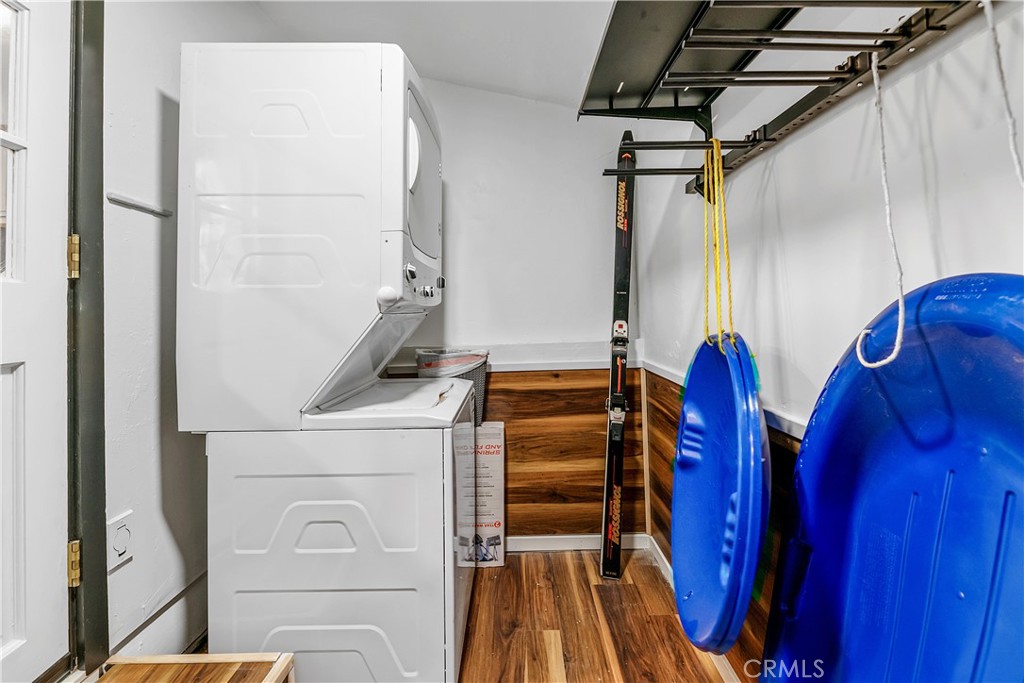 660 Barrett Way Big Bear City, CA 92314 - Photo 30 of 32 a view of walk in closet with clothes and shoes