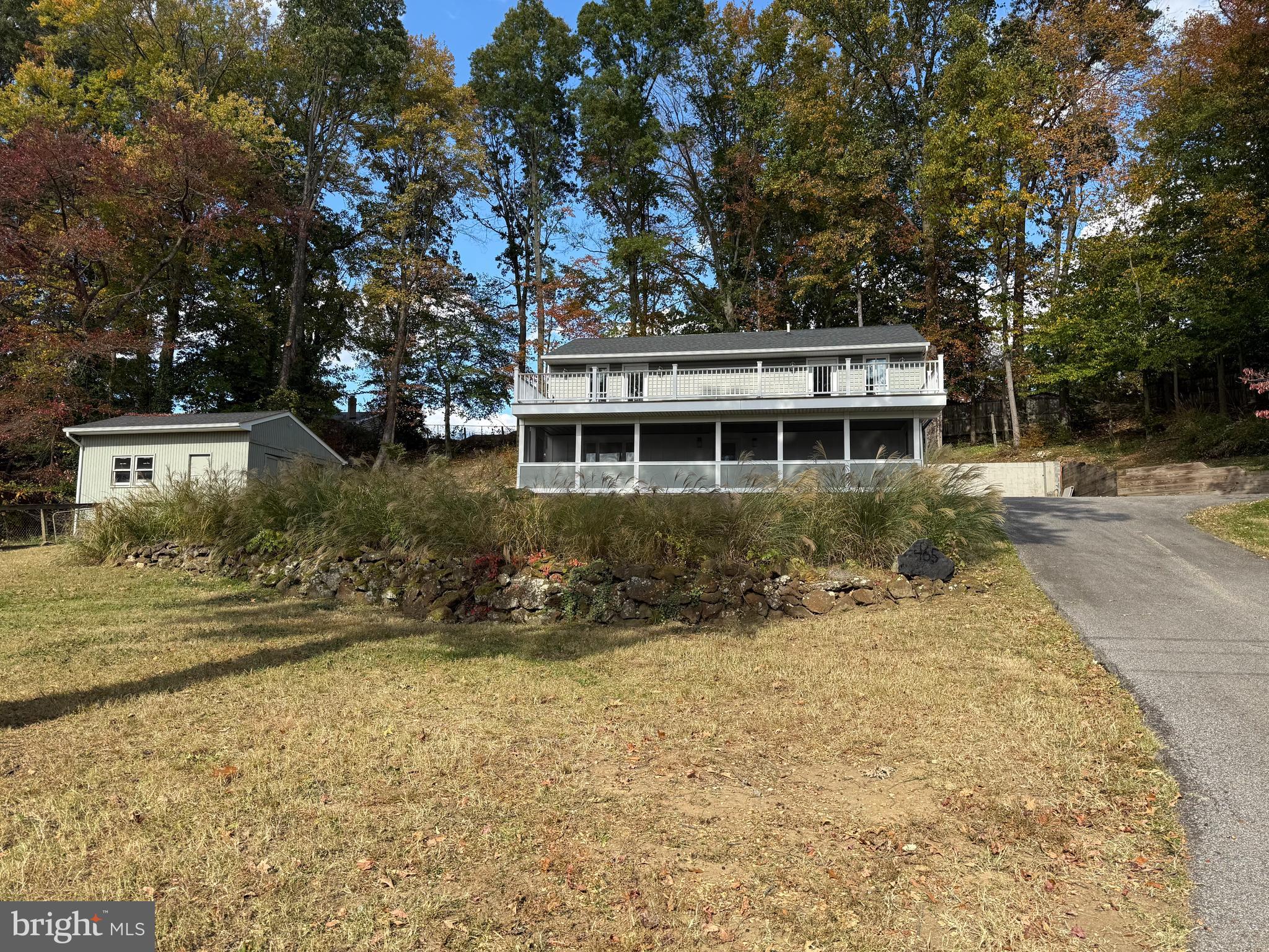 453 Walnut Drive Edgewater, MD 21037 - Photo 1 of 46 a view of a house with a yard