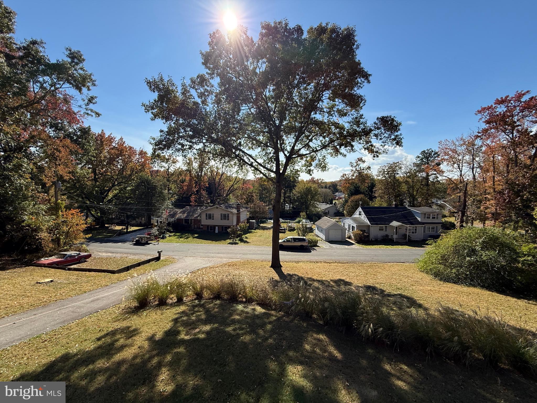453 Walnut Drive Edgewater, MD 21037 - Photo 22 of 46 a view of a road with a yard