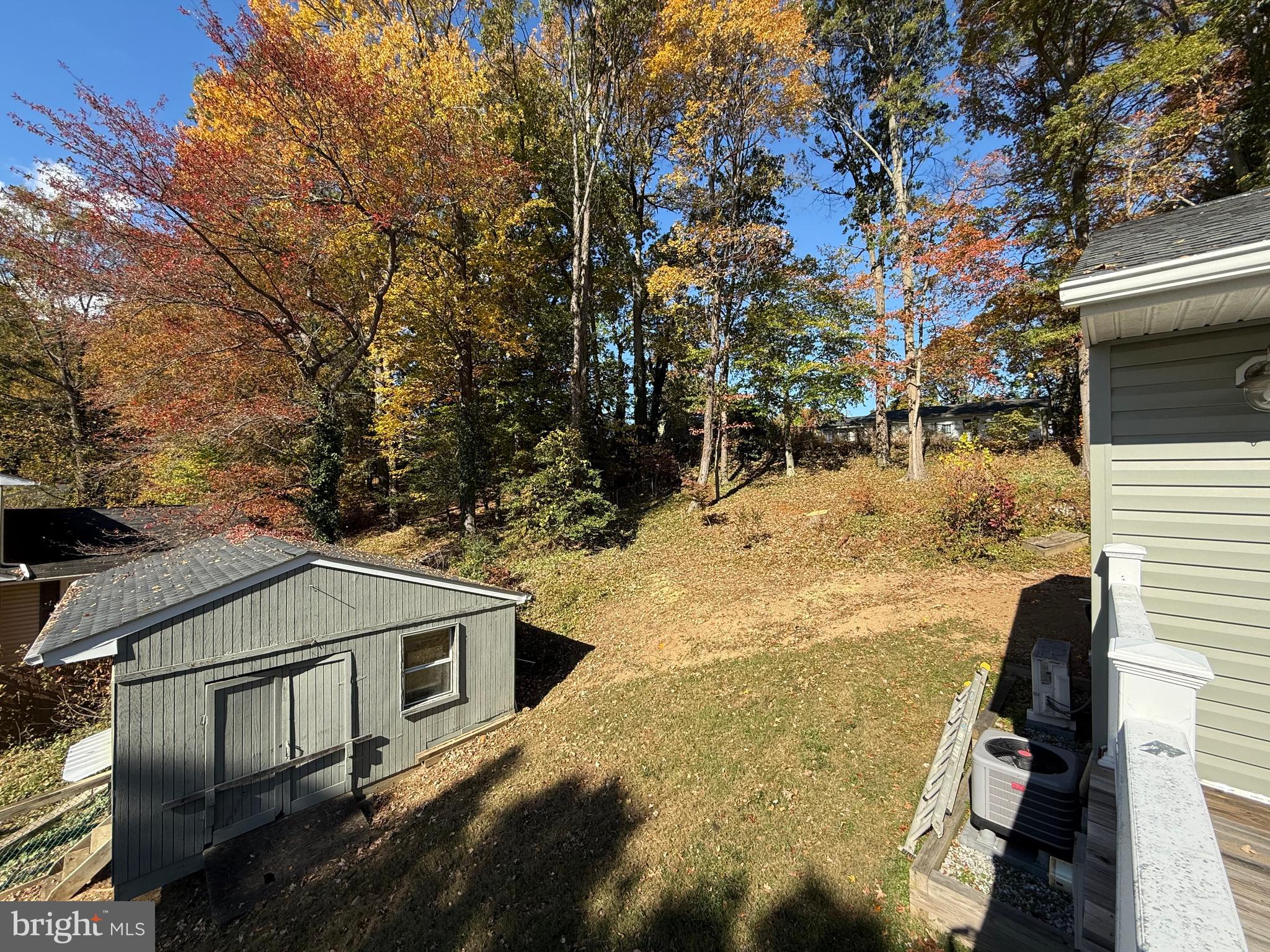 453 Walnut Drive Edgewater, MD 21037 - Photo 39 of 46 a house with trees in the background
