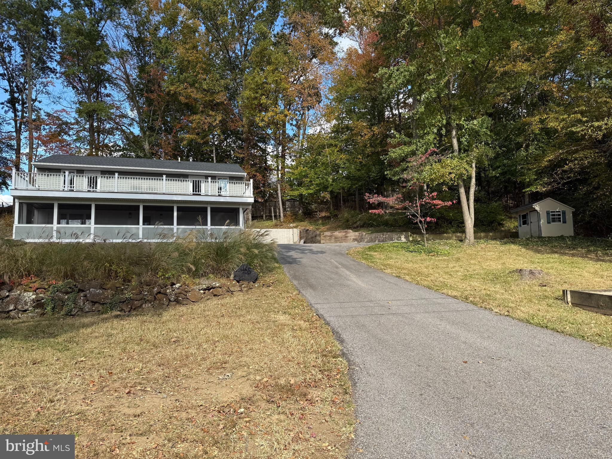 453 Walnut Drive Edgewater, MD 21037 - Photo 45 of 46 front view of a house with a yard