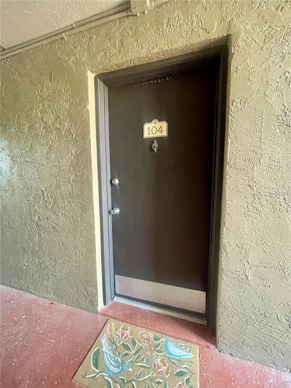 425 Wymore Road, Unit 104 Altamonte Springs, FL 32714 - Photo 1 of 1 Front