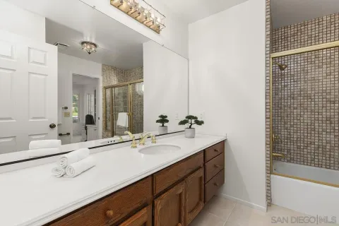 a view of a town with mountains in the background