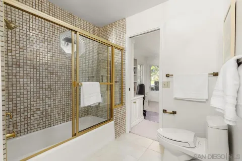 a view of a patio with couches table and chairs