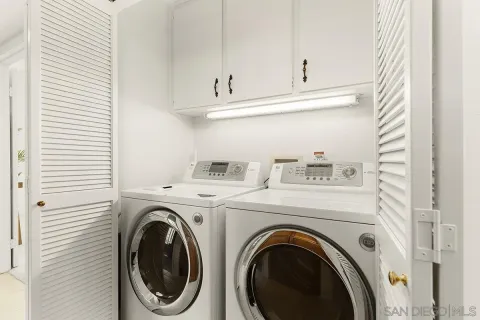 a view of a patio with couches chairs and potted plants