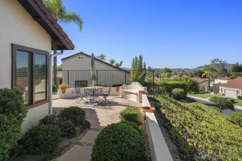 an aerial view of residential houses and outdoor space