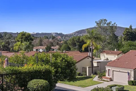 an aerial view of residential house and outdoor space