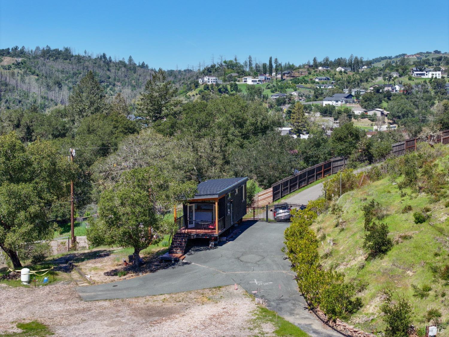 1033 Sundown Trail Santa Rosa, CA 95404 - Photo 12 of 45 a view of a house with a yard and sitting area