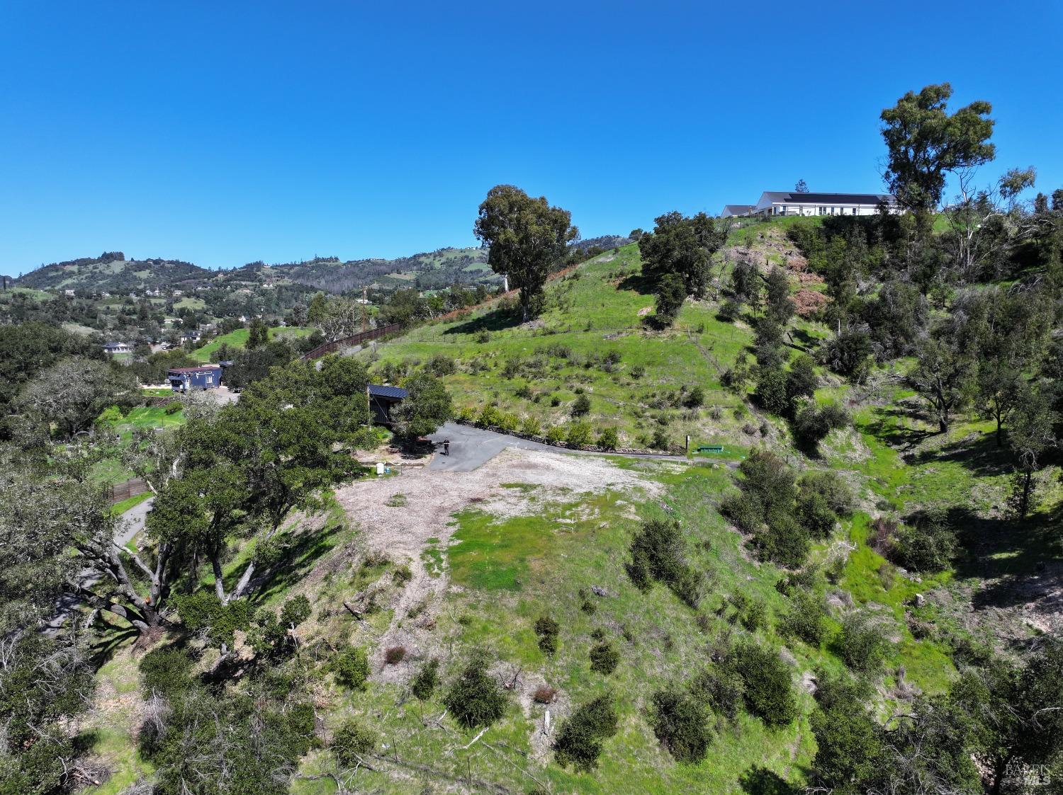 1033 Sundown Trail Santa Rosa, CA 95404 - Photo 14 of 45 a view of a green field with lots of bushes