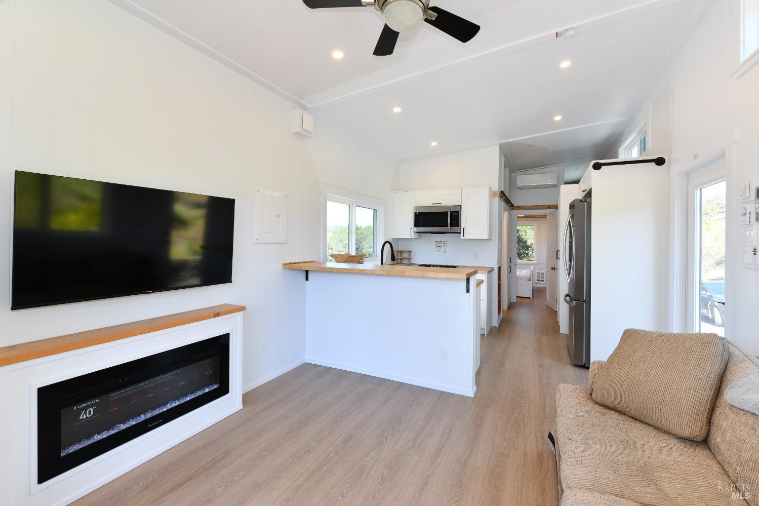 1033 Sundown Trail Santa Rosa, CA 95404 - Photo 36 of 45 a view of kitchen with microwave stove refrigerator and oven