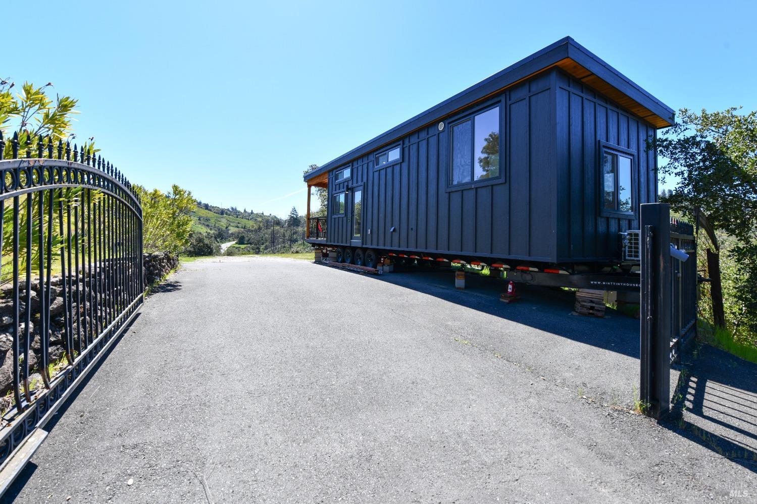 1033 Sundown Trail Santa Rosa, CA 95404 - Photo 41 of 45 a view of a house with a wooden fence