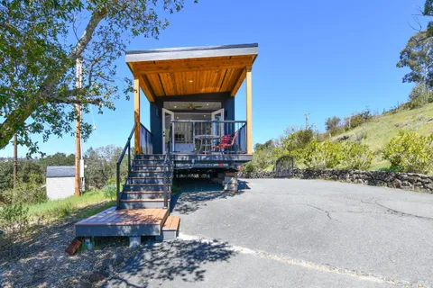 a balcony with wooden floor