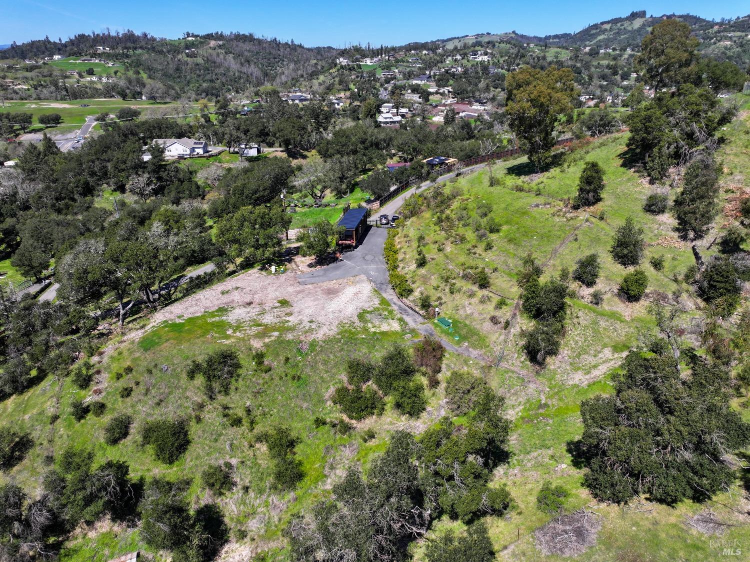 1033 Sundown Trail Santa Rosa, CA 95404 - Photo 10 of 45 a view of a forest with a house