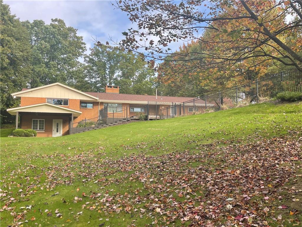 628 Saxonburg Road Butler, PA 16002 - Photo 11 of 46 a view of a house with a yard