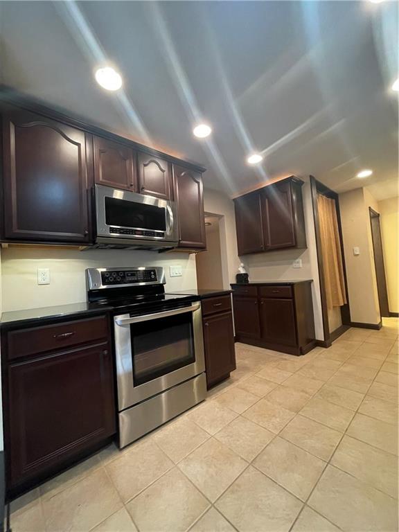 628 Saxonburg Road Butler, PA 16002 - Photo 19 of 46 a kitchen with stainless steel appliances and cabinets