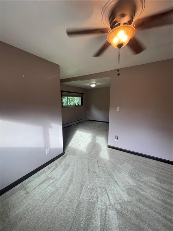 628 Saxonburg Road Butler, PA 16002 - Photo 29 of 46 an empty room with a empty space and a chandelier fan