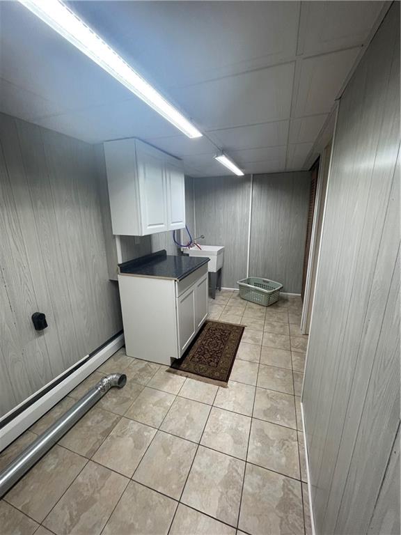 628 Saxonburg Road Butler, PA 16002 - Photo 35 of 46 a room with a washing machine and cabinets