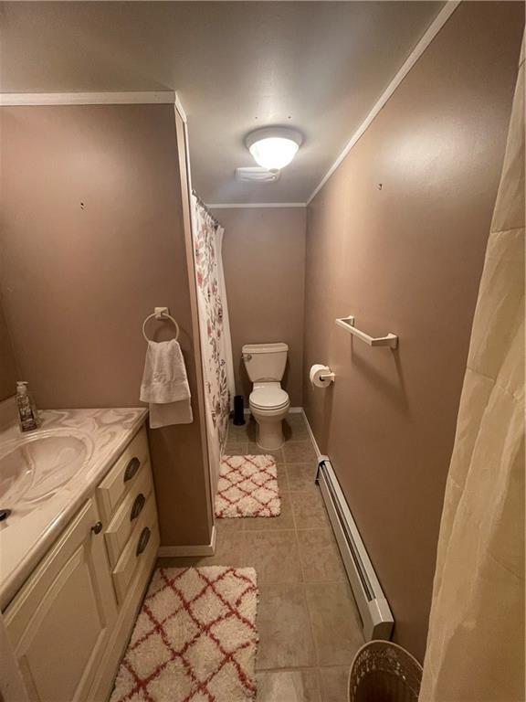 628 Saxonburg Road Butler, PA 16002 - Photo 42 of 46 a bathroom with a sink a toilet and a mirror