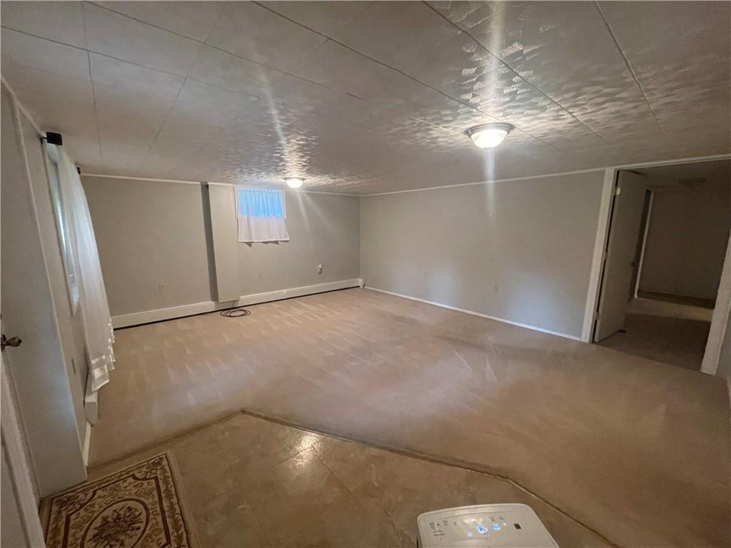 628 Saxonburg Road Butler, PA 16002 - Photo 44 of 46 en empty room with window and hardwood floor