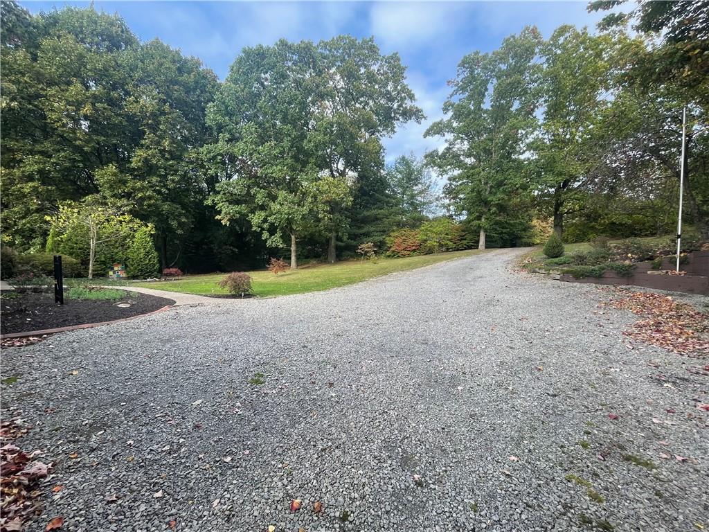 628 Saxonburg Road Butler, PA 16002 - Photo 10 of 46 a view of a field with trees in background
