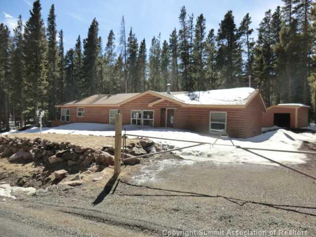 865 Silver Creek Road Idaho Springs, CO 80452 - Photo 1 of 11 a view of a house with a yard