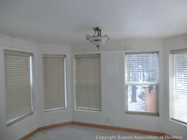 865 Silver Creek Road Idaho Springs, CO 80452 - Photo 5 of 11 a view of an empty room with a window