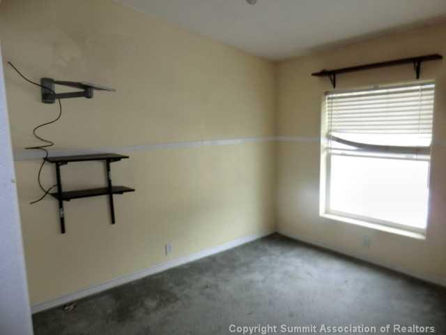 865 Silver Creek Road Idaho Springs, CO 80452 - Photo 8 of 11 a view of an empty room with a window