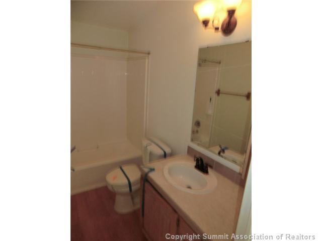 865 Silver Creek Road Idaho Springs, CO 80452 - Photo 9 of 11 a bathroom with a sink and mirror