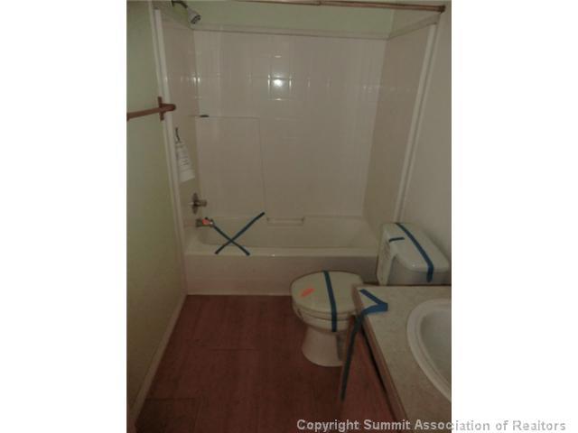 865 Silver Creek Road Idaho Springs, CO 80452 - Photo 10 of 11 a bathroom with a shower