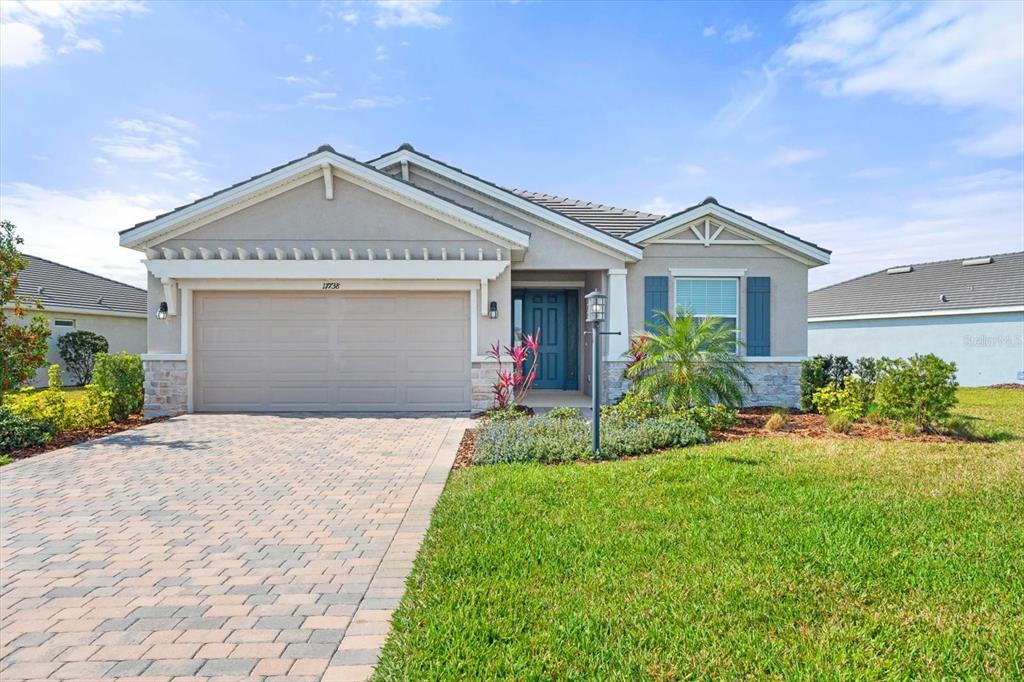17738 Pastureland Avenue Lakewood Ranch, FL 34211 - Photo 1 of 50 a view of a house with a yard