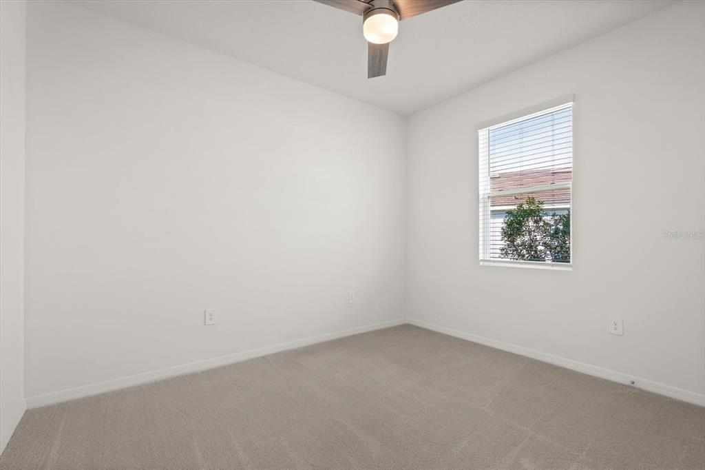 17738 Pastureland Avenue Lakewood Ranch, FL 34211 - Photo 19 of 50 an empty room with a window