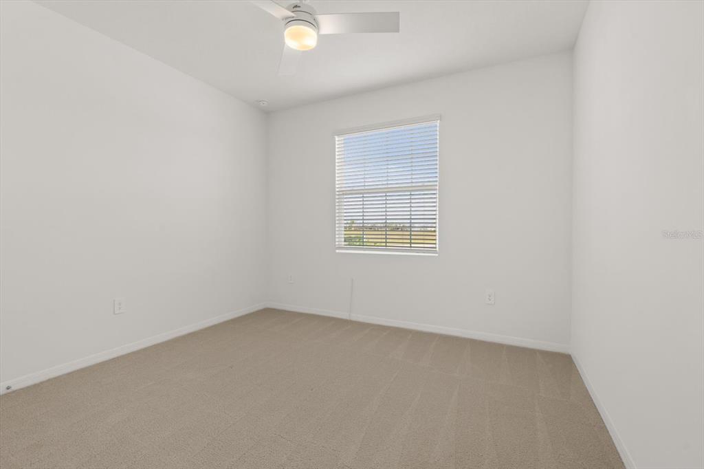 17738 Pastureland Avenue Lakewood Ranch, FL 34211 - Photo 23 of 50 an empty room with a window