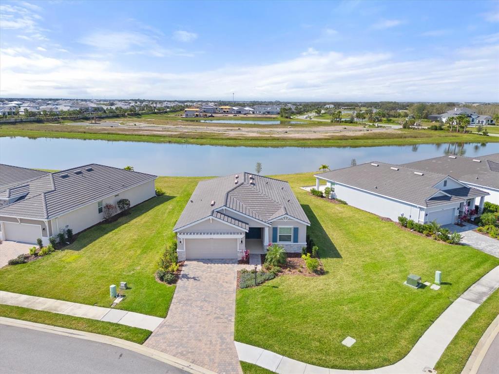 17738 Pastureland Avenue Lakewood Ranch, FL 34211 - Photo 30 of 50 a view of a swimming pool with an ocean view