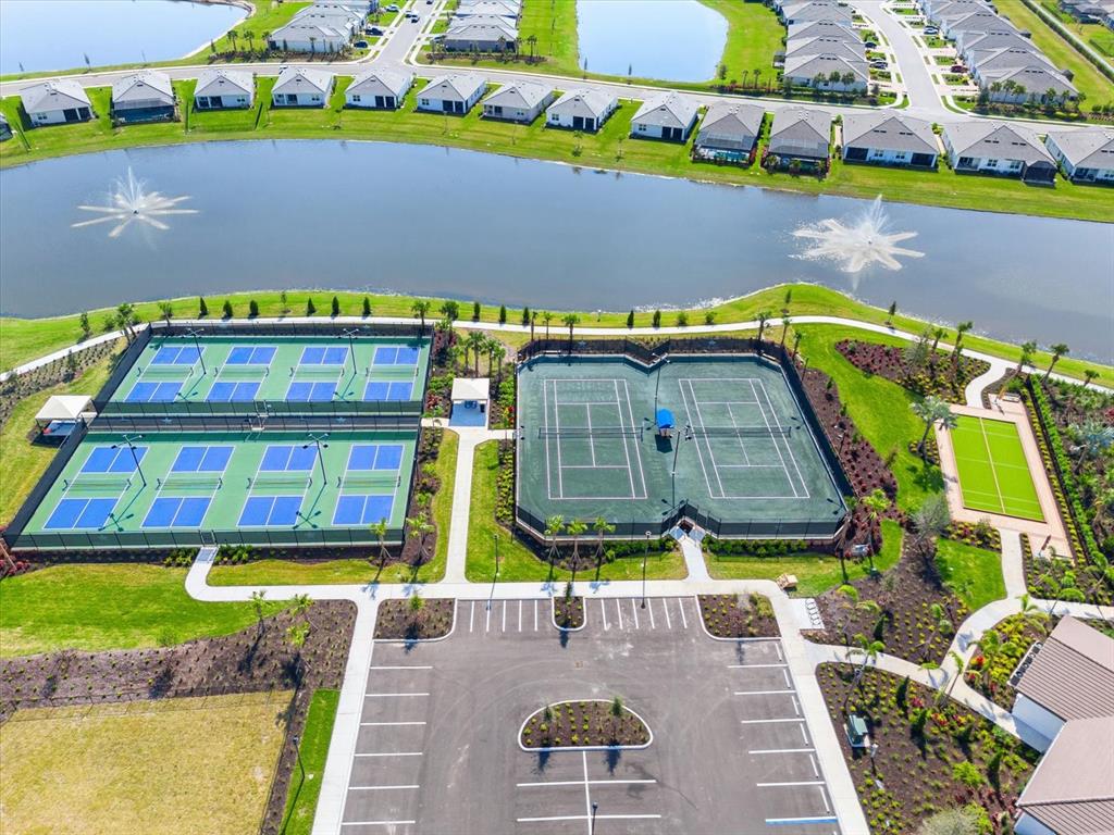 17738 Pastureland Avenue Lakewood Ranch, FL 34211 - Photo 36 of 50 swimming pool with outdoor seating and yard