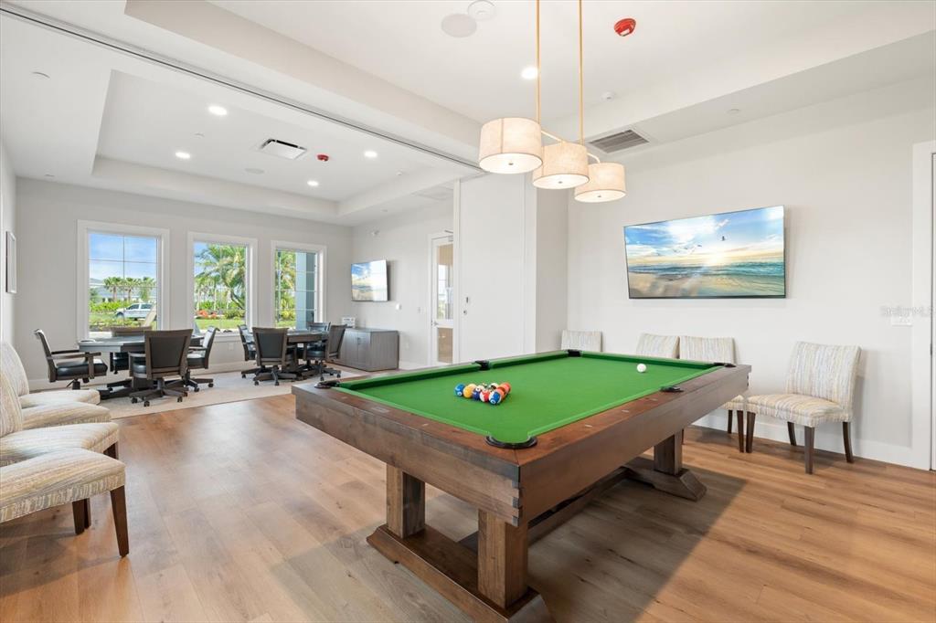 17738 Pastureland Avenue Lakewood Ranch, FL 34211 - Photo 39 of 50 a room with pool table and windows