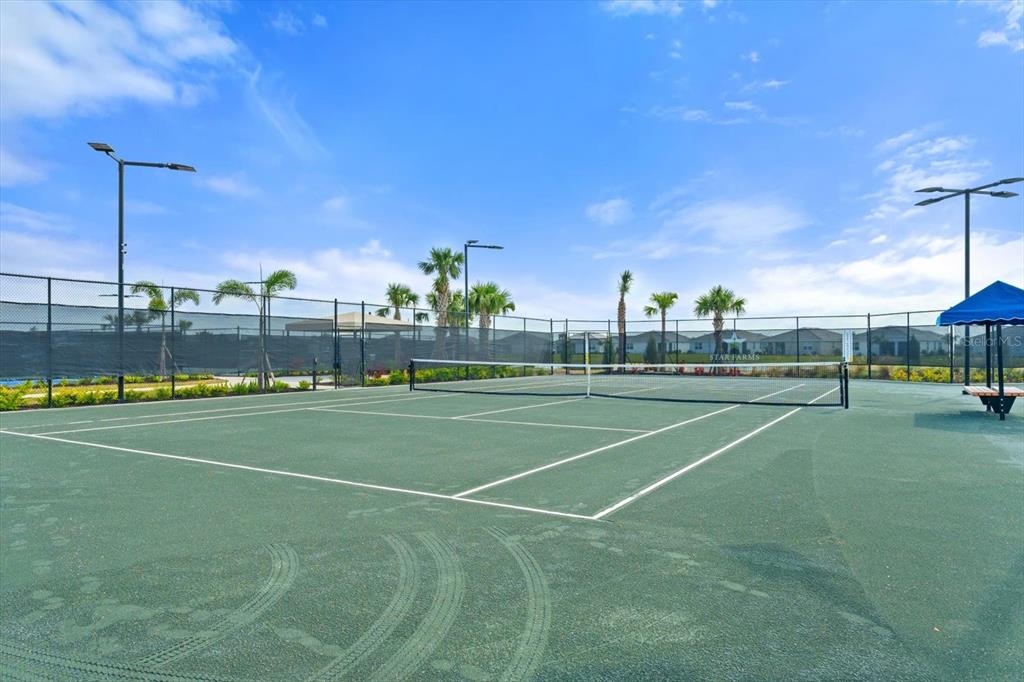 17738 Pastureland Avenue Lakewood Ranch, FL 34211 - Photo 49 of 50 a view of a tennis court