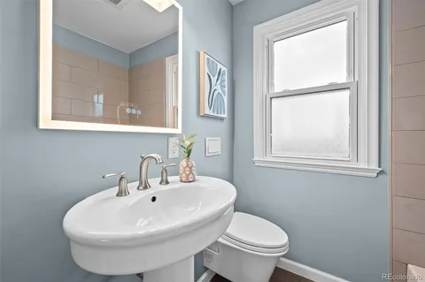 a bathroom with a sink and a toilet