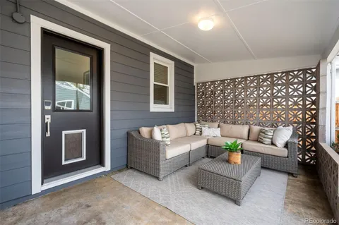 a building outdoor space with patio furniture