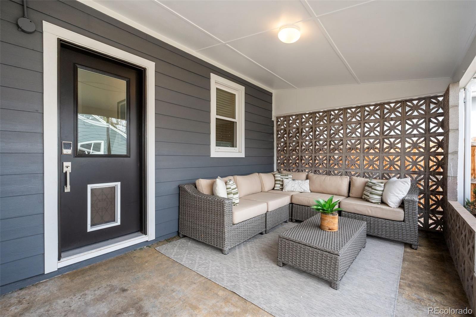 2344 South Lafayette Street Denver, CO 80210 - Photo 27 of 32 a building outdoor space with patio furniture