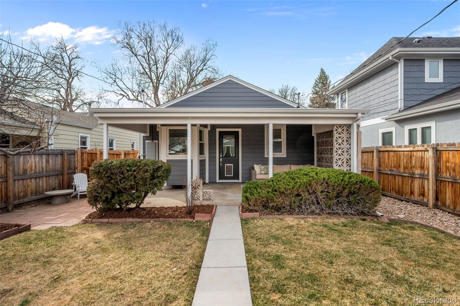 2344 South Lafayette Street Denver, CO 80210 - Photo 29 of 32 a view of a house with backyard and sitting area