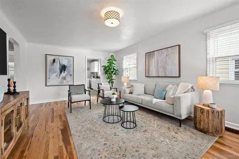 a living room with furniture and a couch