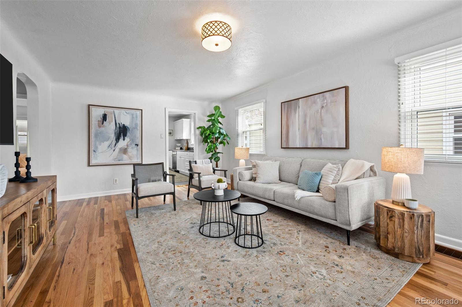 2344 South Lafayette Street Denver, CO 80210 - Photo 4 of 32 a living room with furniture and a couch